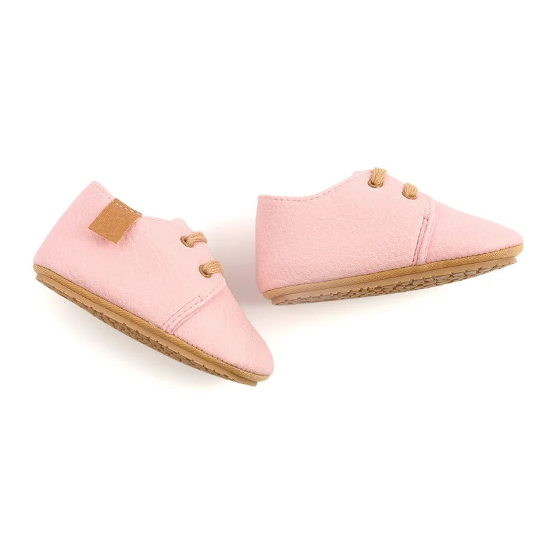 Image of Baby Retro Laced Sneakers in Pink from Baby Booties Boutique