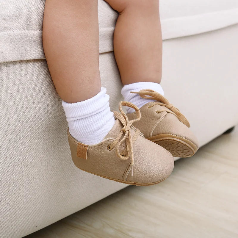 Image of Baby Retro Laced Sneakers in Khaki from Baby Booties Boutique