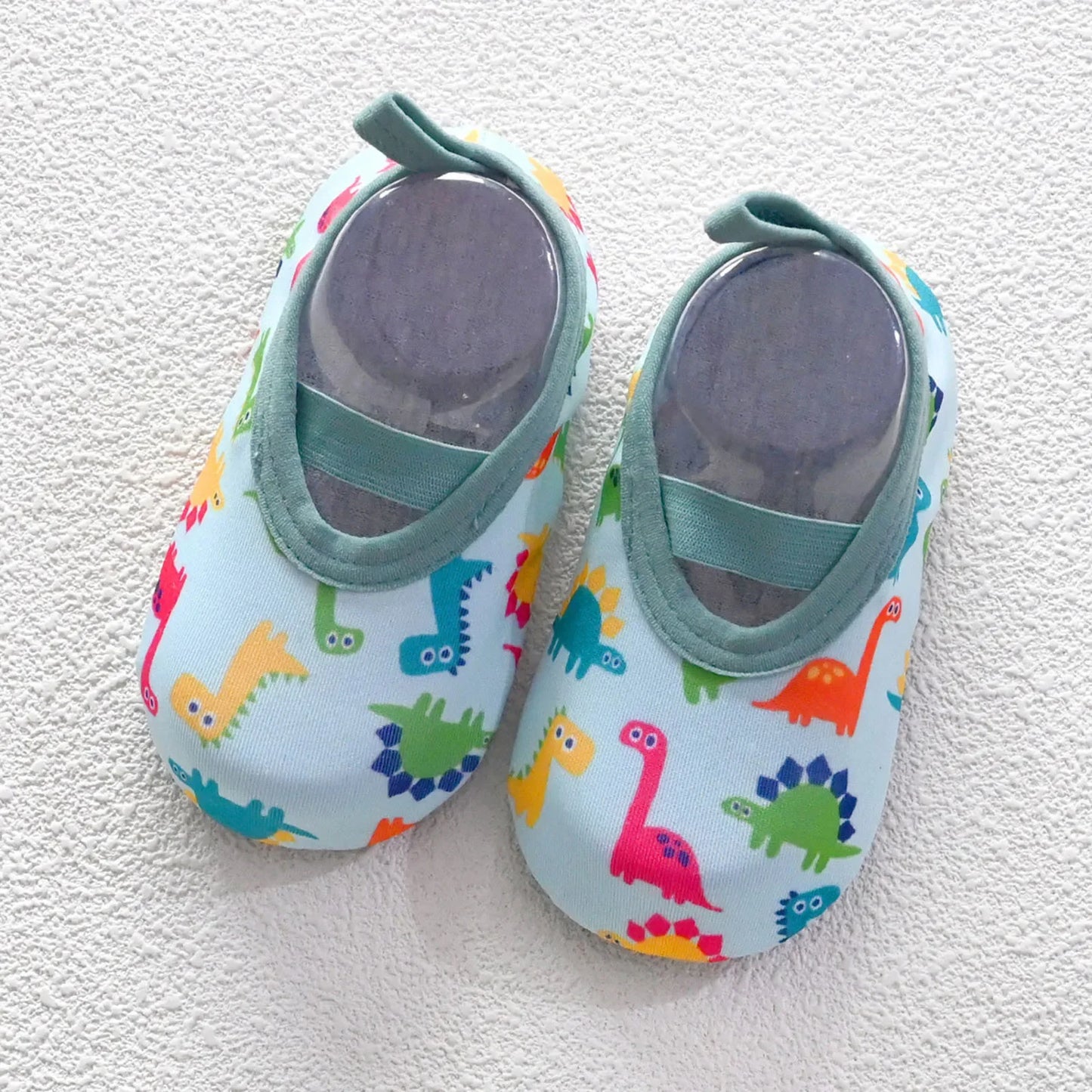 Image of Water Sport Baby Shoes in white w/ dinosaurs from Baby Booties Boutique