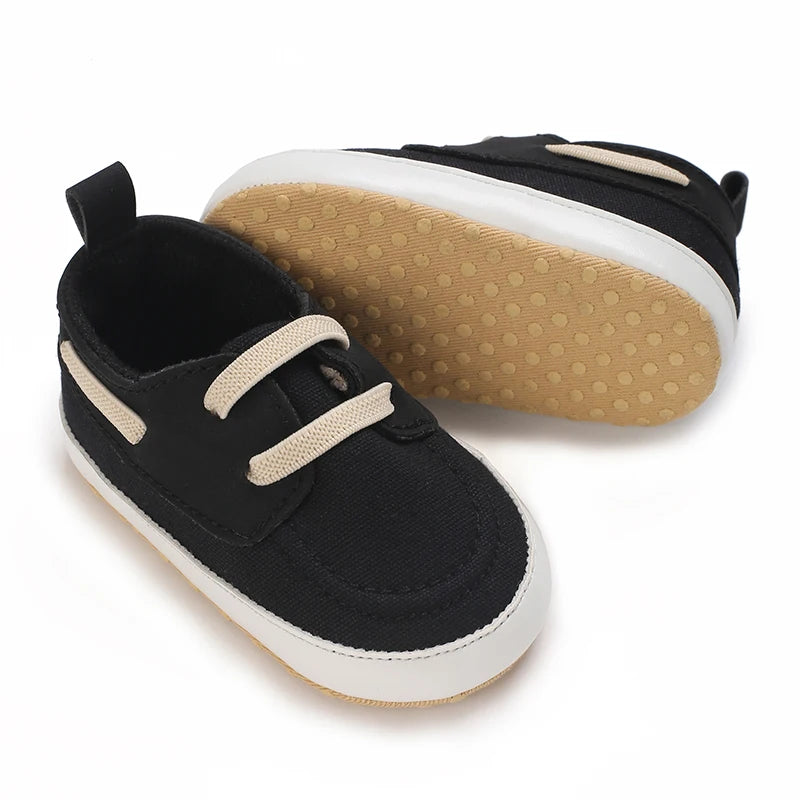 Image of infant boat shoes in black from Baby Booties Boutique