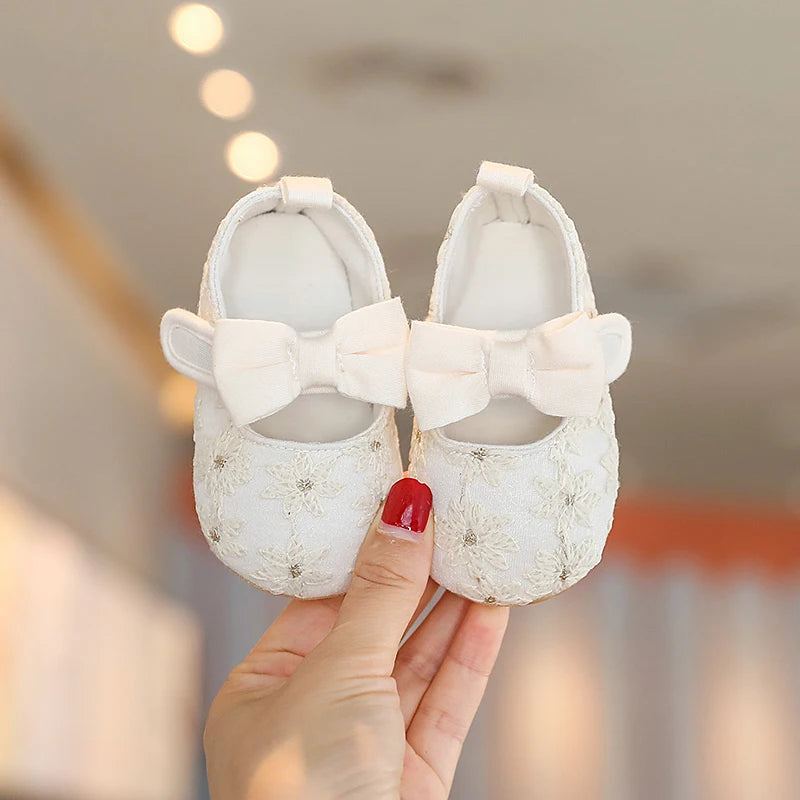 Image of Princess Lace with Bows Shoes in white/silver from Baby Booties Boutique