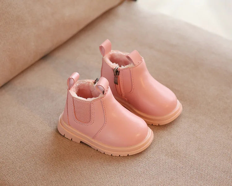 Image of warm fur boots in pink from Baby Booties Boutique