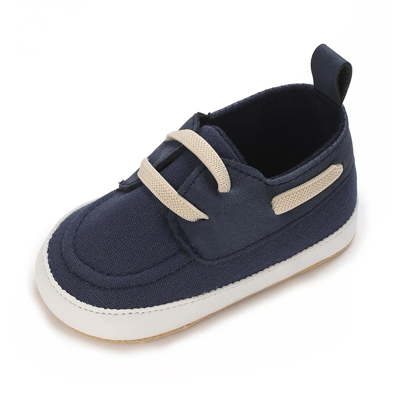 Image of infant boat shoes in navy from Baby Booties Boutique