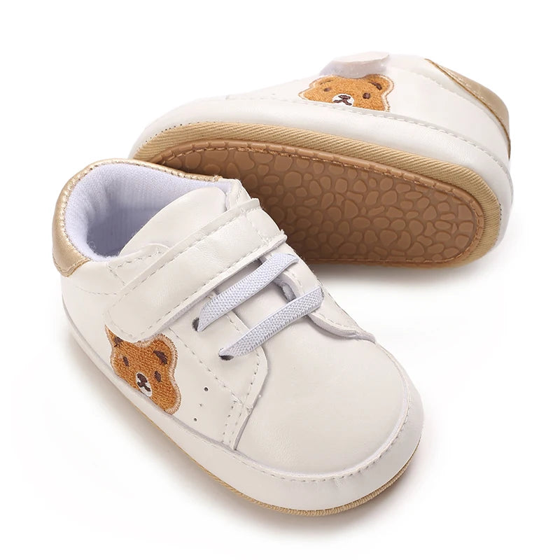 Image of velcro bear sneakers in white w/ gold from Baby Booties Boutique