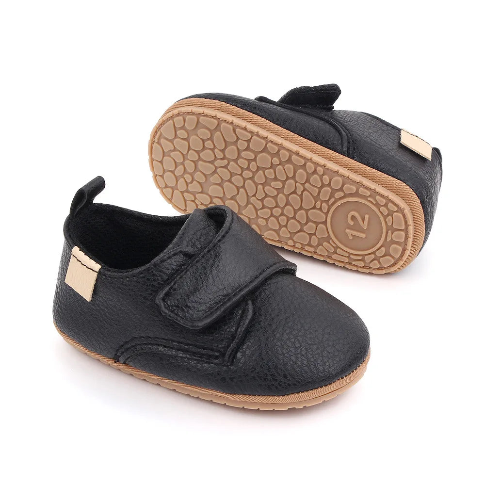 Image of Baby Retro Strapped Slip-On in black from Baby Booties Boutique