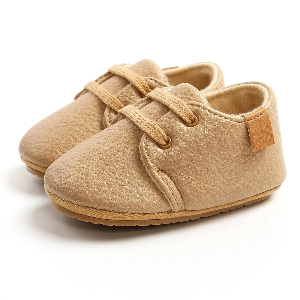 Image of Baby Retro Laced Sneakers in Khaki from Baby Booties Boutique