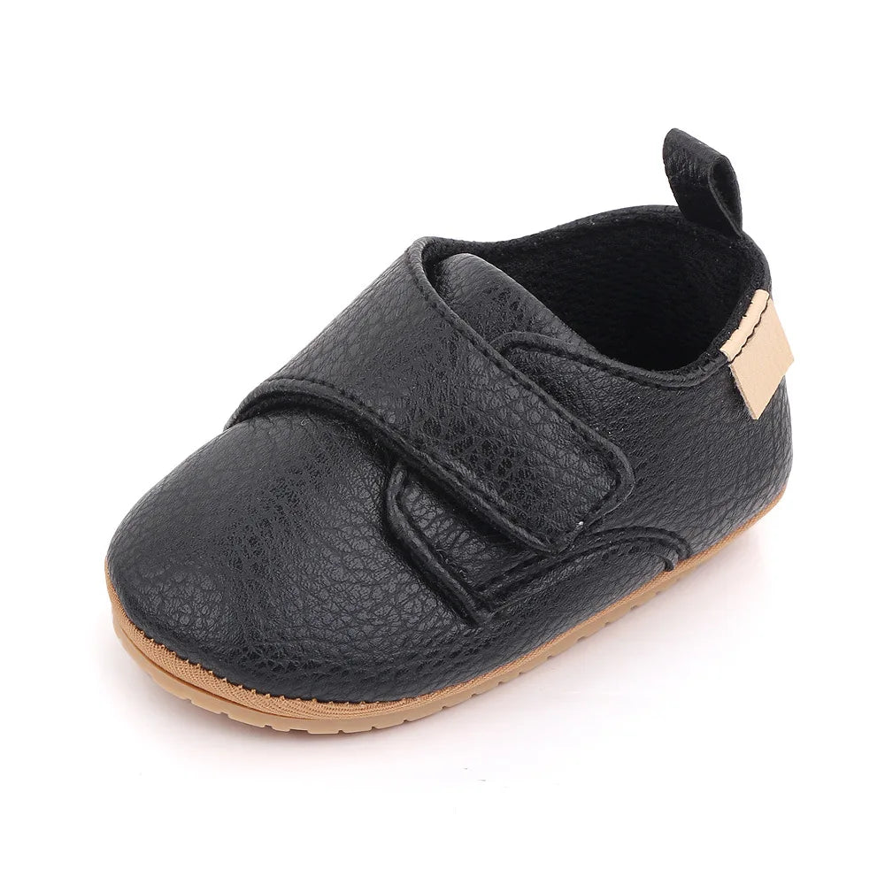 Image of Baby Retro Strapped Slip-On in black from Baby Booties Boutique