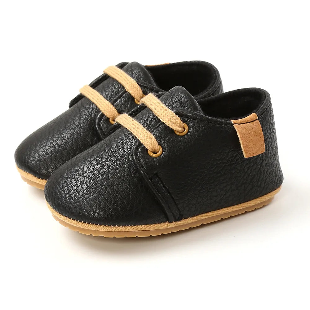 Image of Baby Retro Laced Sneakers in Black from Baby Booties Boutique