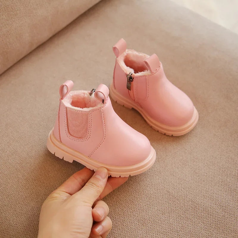 Image of warm fur boots in pink from Baby Booties Boutique