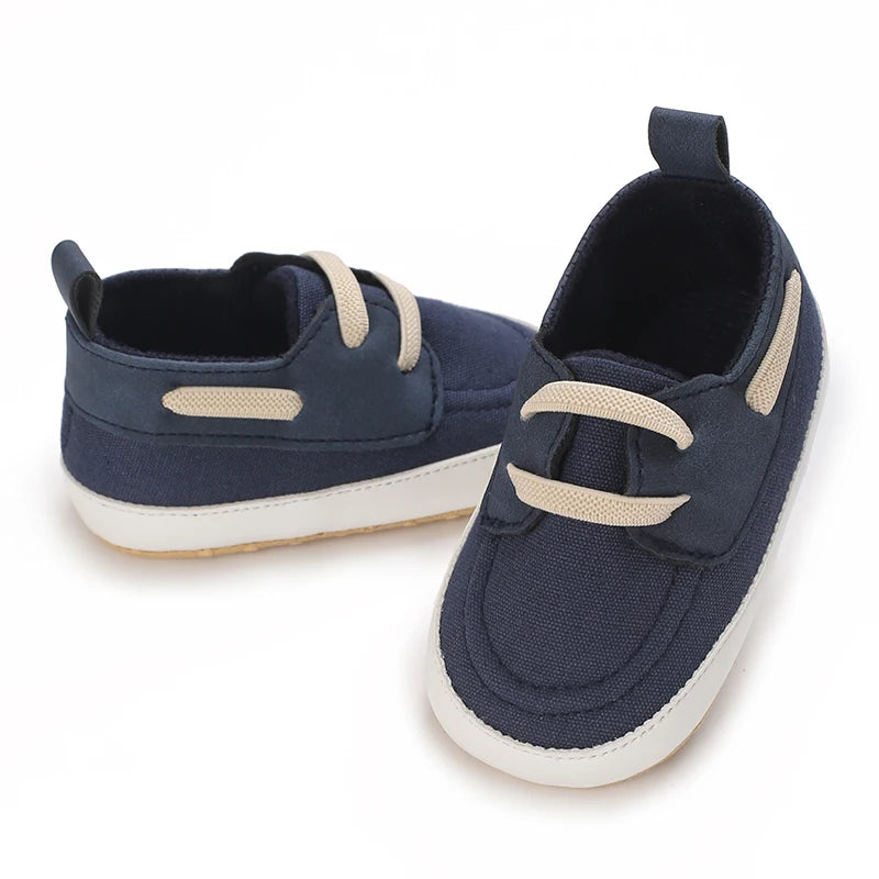 Image of infant boat shoes in navy from Baby Booties Boutique