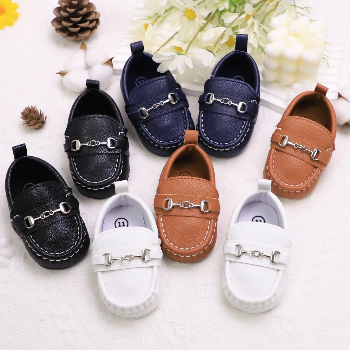 Image of First Walker Slip-on Loafers in various colors from Baby Booties Boutique