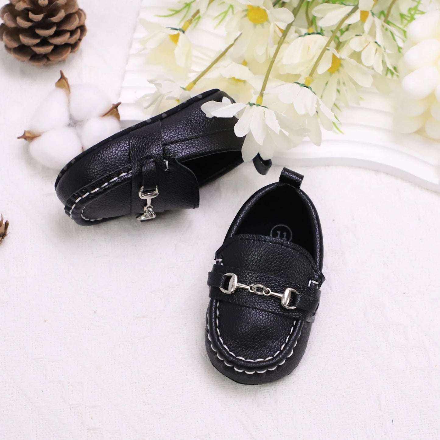 Image of First Walker Slip-on Loafers in black from Baby Booties Boutique