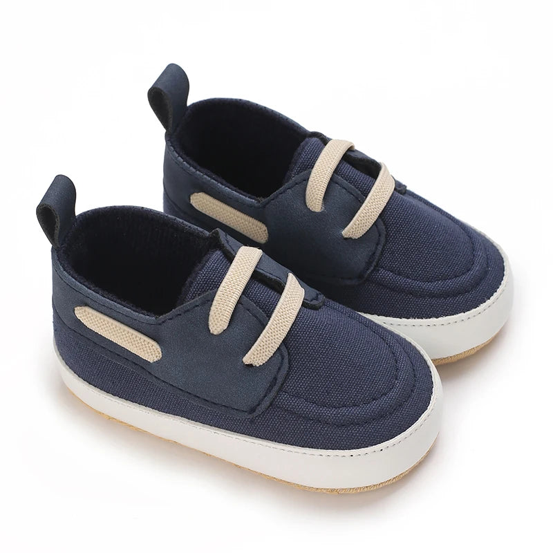 Image of infant boat shoes in navy from Baby Booties Boutique