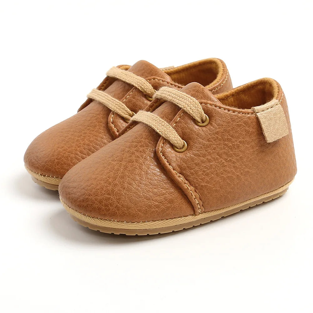 Image of Baby Retro Laced Sneakers in Brown from Baby Booties Boutique